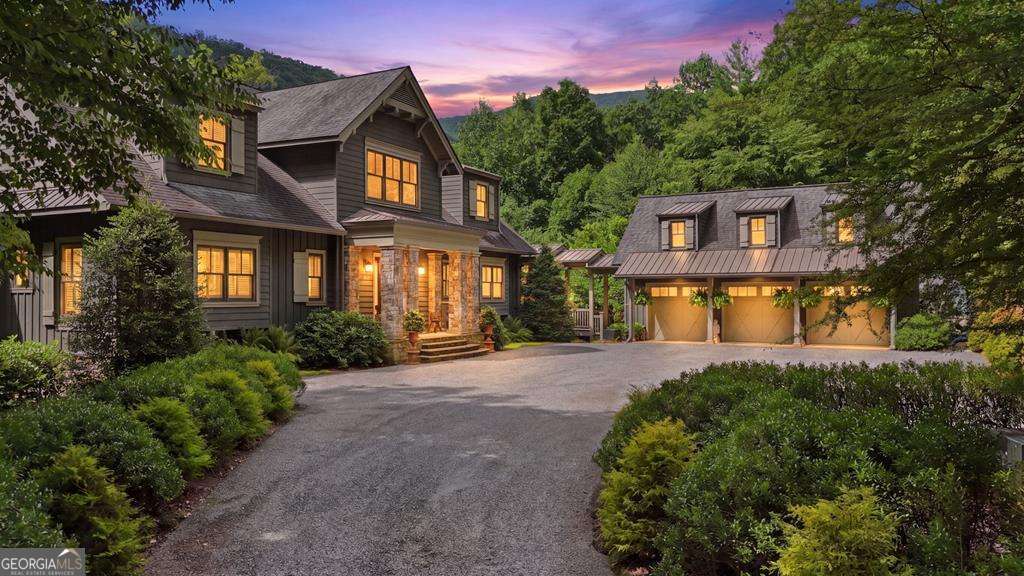 Mountain estate exterior at dusk